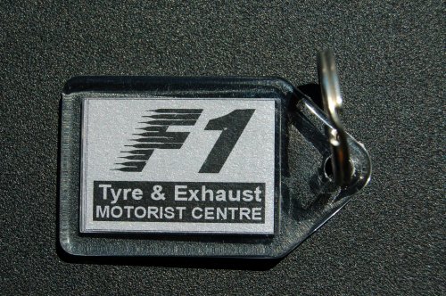 Branded key fobs from the Motor Trade Signs project archive